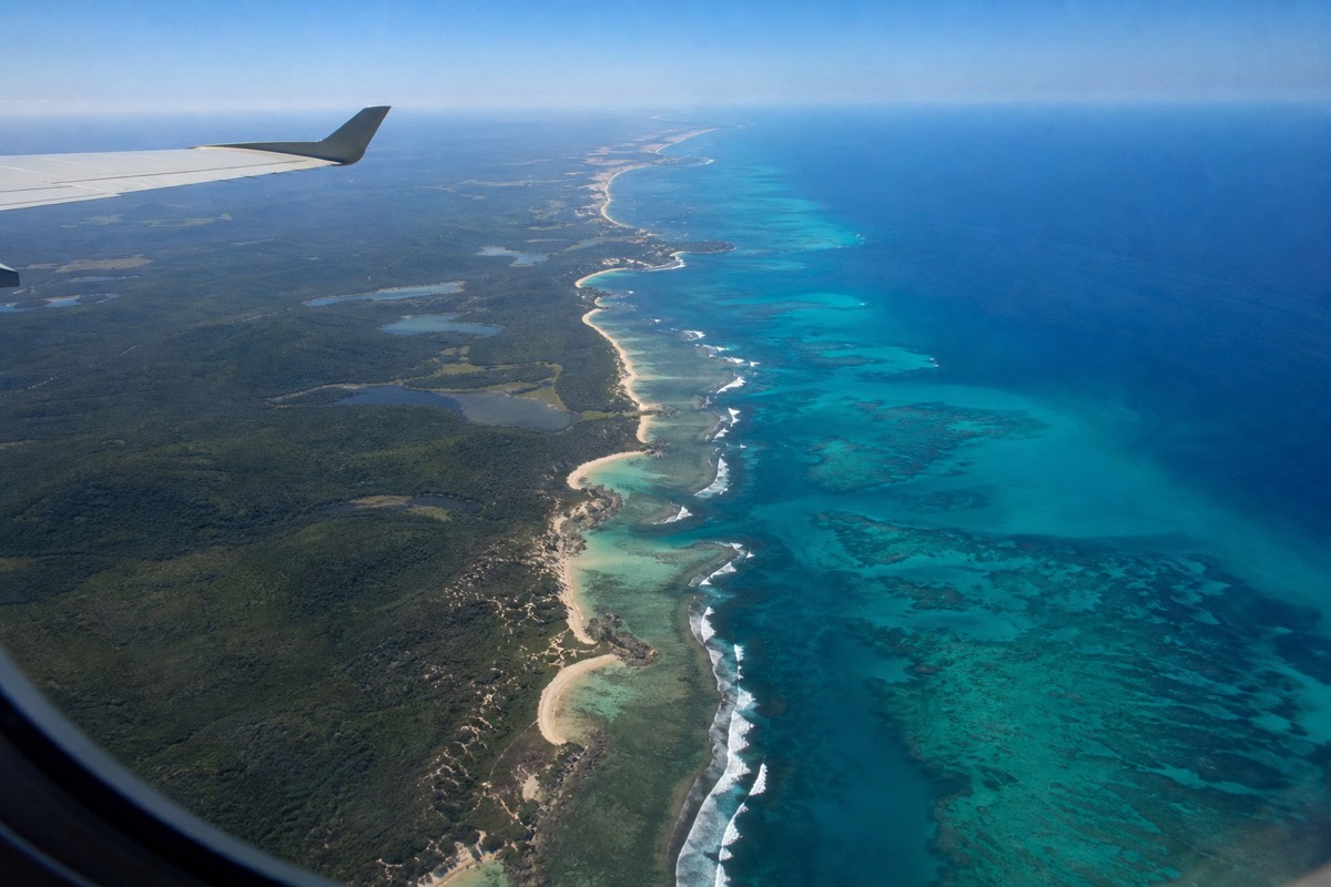 View of the Queensland coastline from a plane window en route to the Great Barrier Reef